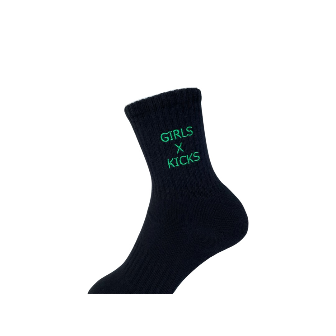 Black cotton crew length socks with green GXK embroidery